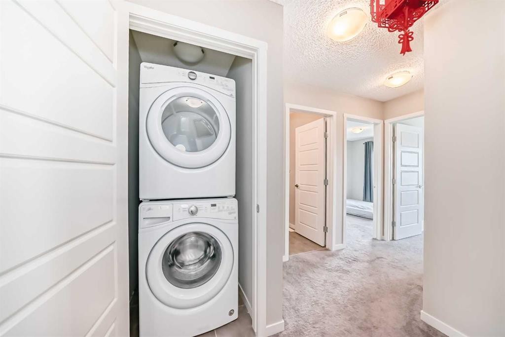 621 Nolanlake Villas Nw, Calgary, AB - Indoor Photo Showing Laundry Room