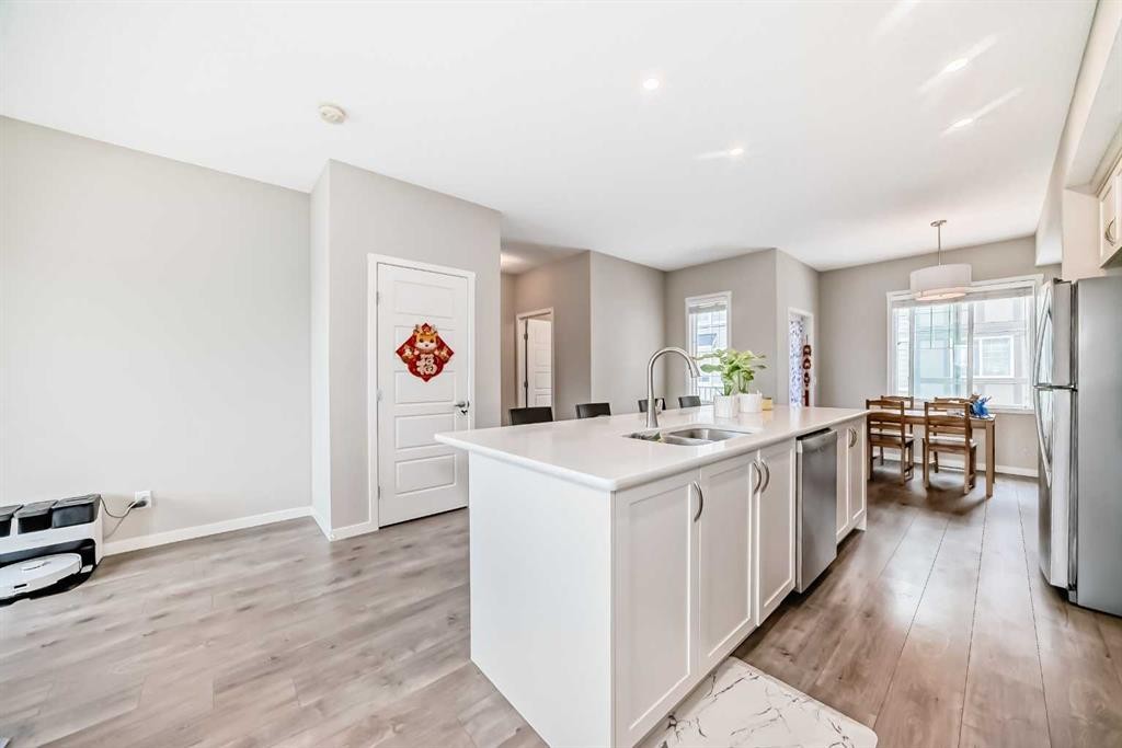 621 Nolanlake Villas Nw, Calgary, AB - Indoor Photo Showing Kitchen With Double Sink