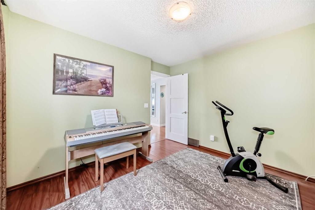 19 Mchugh Place Ne, Calgary, AB - Indoor Photo Showing Gym Room