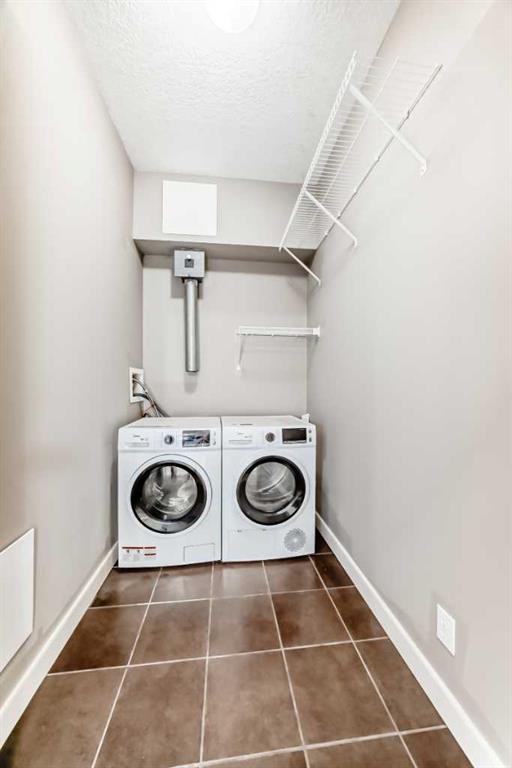 213-10 Discovery Ridge Close Sw, Calgary, AB - Indoor Photo Showing Laundry Room