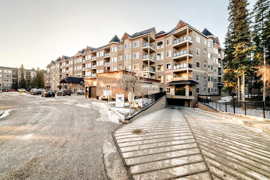 213-10 Discovery Ridge Close Sw, Calgary, AB - Outdoor With Balcony With Facade