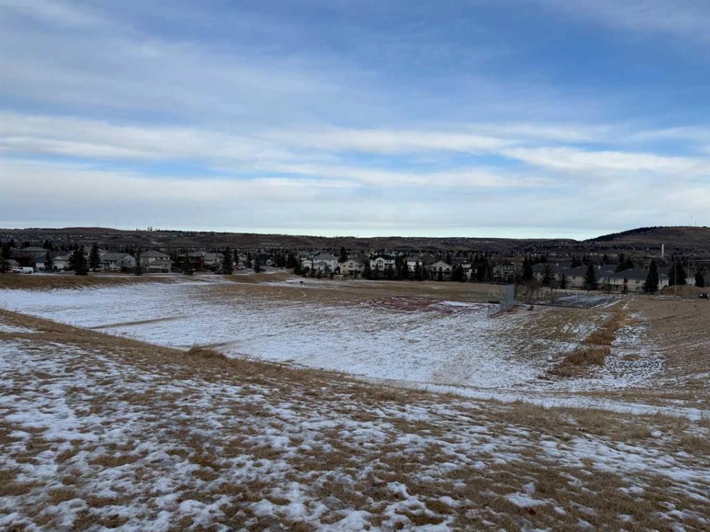 2103 Jumping Pound Common, Cochrane, AB - Outdoor With Body Of Water With View