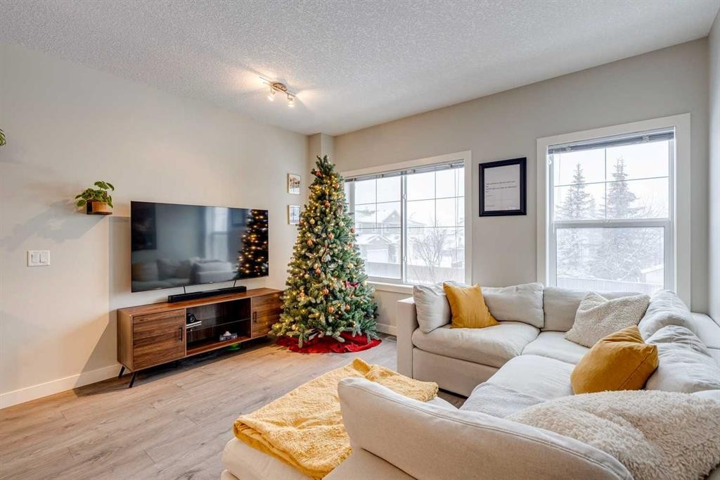 2103 Jumping Pound Common, Cochrane, AB - Indoor Photo Showing Living Room