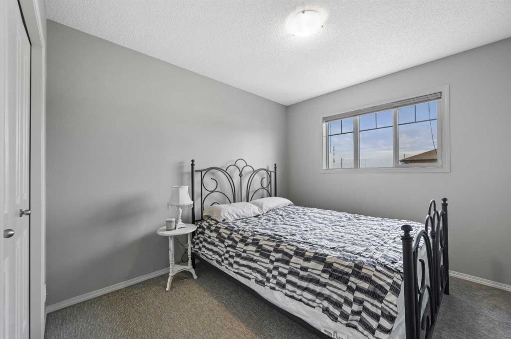 165 Saddlebrook Point Ne, Calgary, AB - Indoor Photo Showing Bedroom