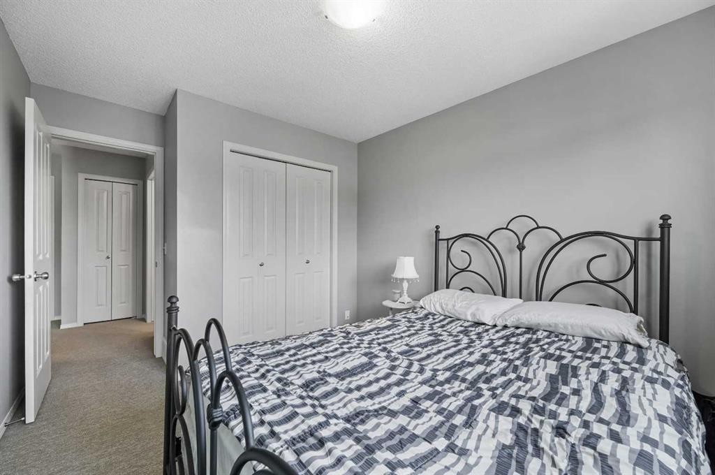 165 Saddlebrook Point Ne, Calgary, AB - Indoor Photo Showing Bedroom