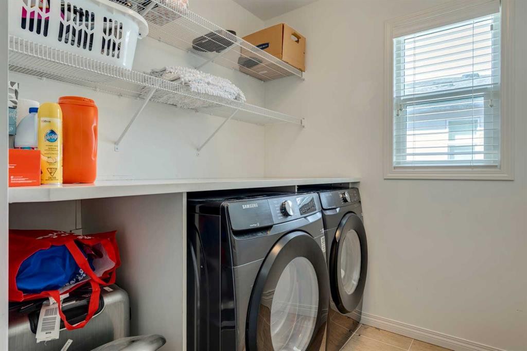 123 Marquis Green Se, Calgary, AB - Indoor Photo Showing Laundry Room