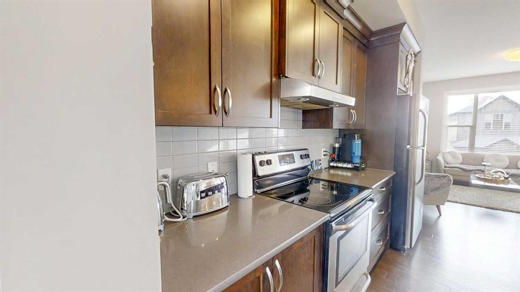 165 Panatella Square Nw, Calgary, AB - Indoor Photo Showing Kitchen