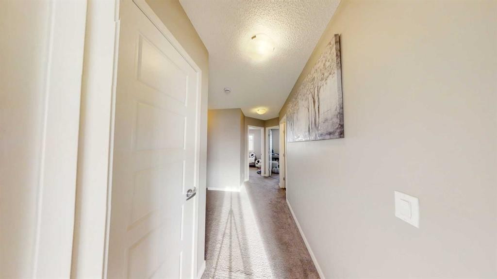 165 Panatella Square Nw, Calgary, AB - Indoor Photo Showing Other Room