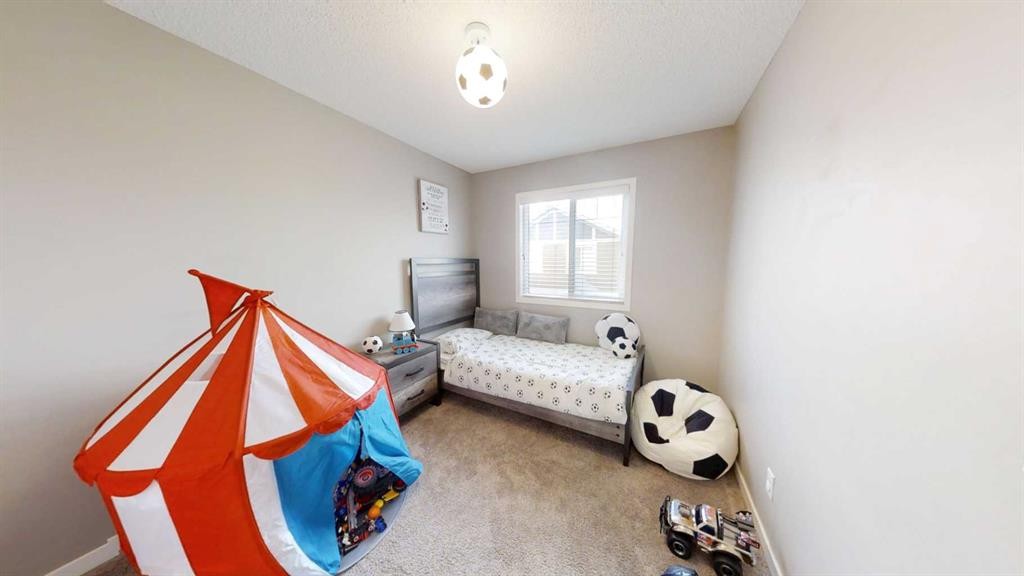 165 Panatella Square Nw, Calgary, AB - Indoor Photo Showing Bedroom