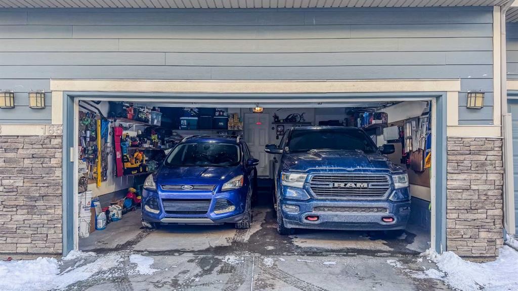 165 Panatella Square Nw, Calgary, AB - Indoor Photo Showing Garage