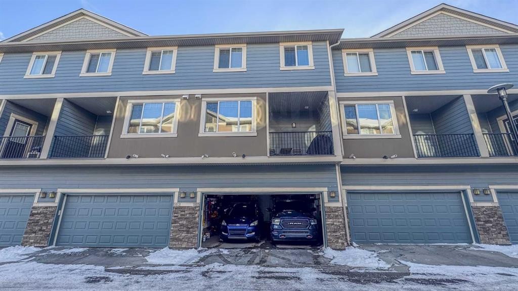 165 Panatella Square Nw, Calgary, AB - Outdoor With Balcony With Facade