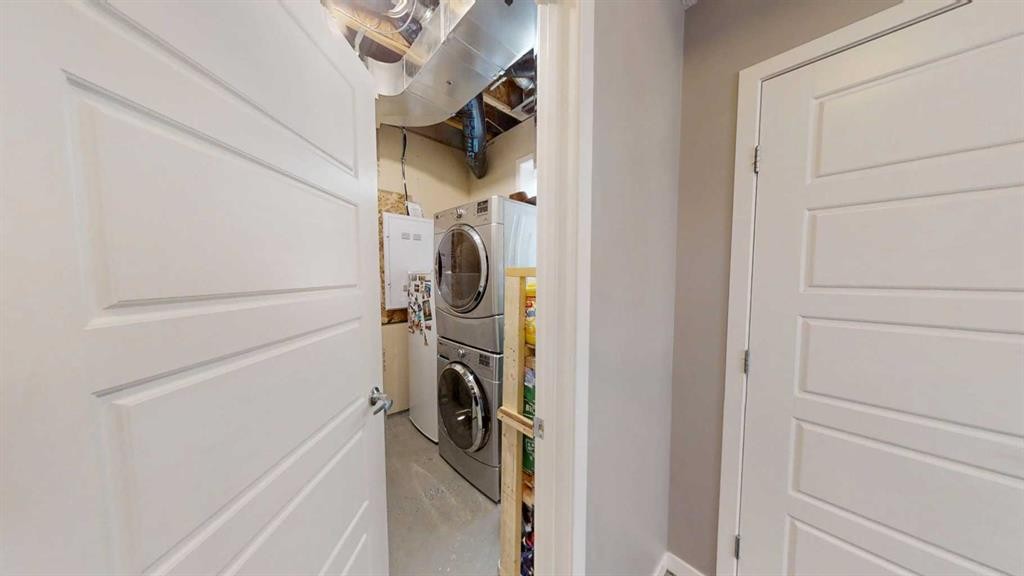 165 Panatella Square Nw, Calgary, AB - Indoor Photo Showing Laundry Room