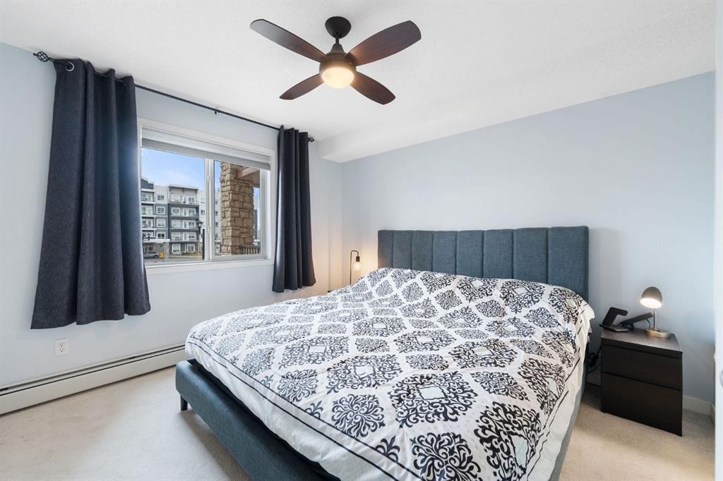 2218-505 Railway Street West, Cochrane, AB - Indoor Photo Showing Bedroom