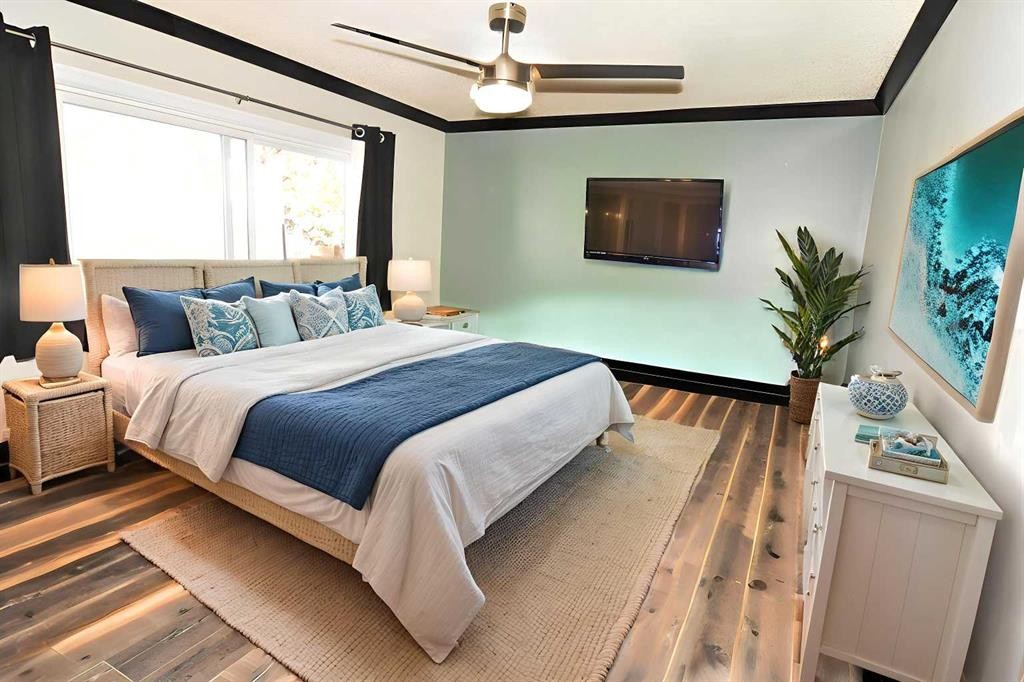 112 Woodvale Road Sw, Calgary, AB - Indoor Photo Showing Bedroom