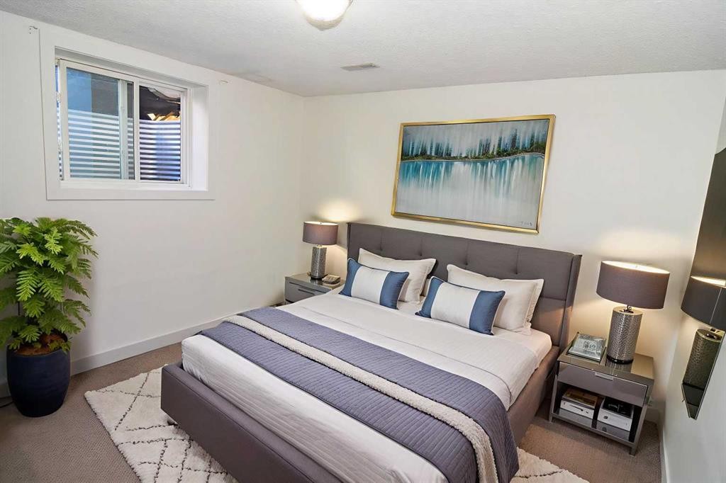 112 Woodvale Road Sw, Calgary, AB - Indoor Photo Showing Bedroom