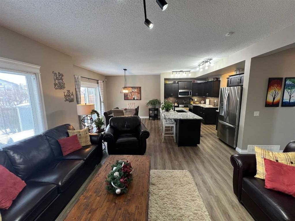 2117 Reunion Boulevard Nw, Airdrie, AB - Indoor Photo Showing Living Room