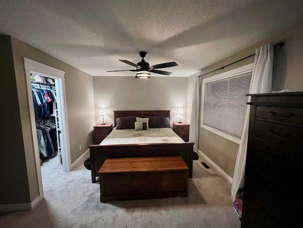 2117 Reunion Boulevard Nw, Airdrie, AB - Indoor Photo Showing Bedroom