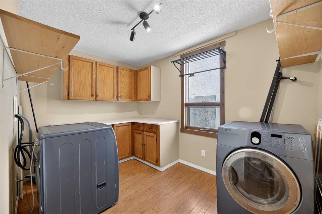 4806 49 Street, Olds, AB - Indoor Photo Showing Laundry Room