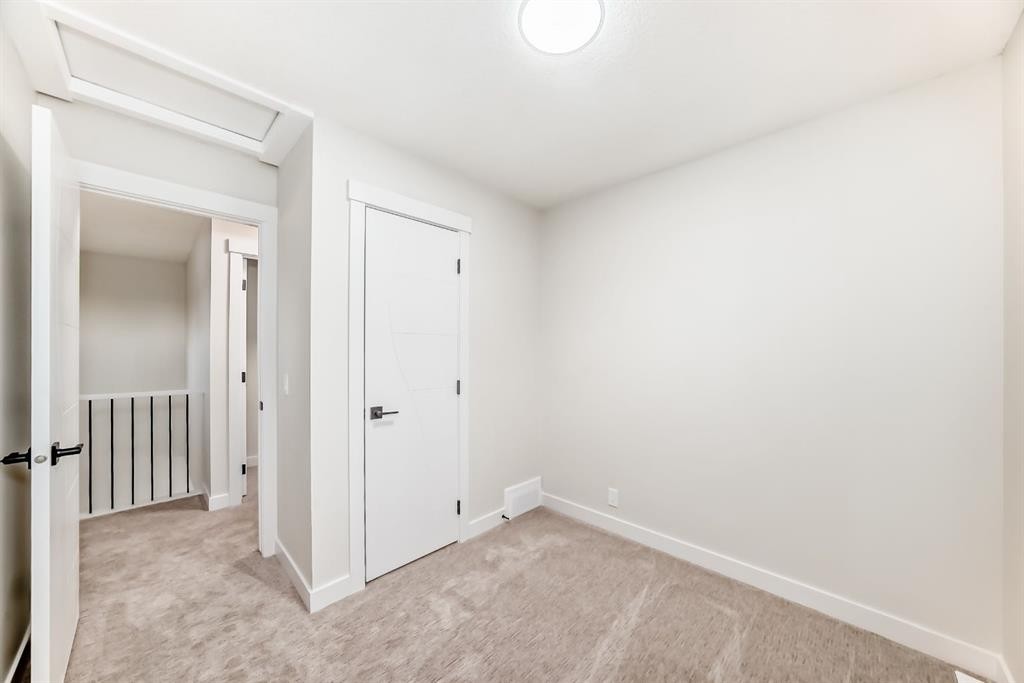 100 Beddington Circle Ne, Calgary, AB - Indoor Photo Showing Other Room