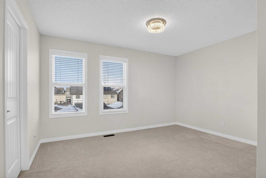 104 Masters Link Se, Calgary, AB - Indoor Photo Showing Other Room