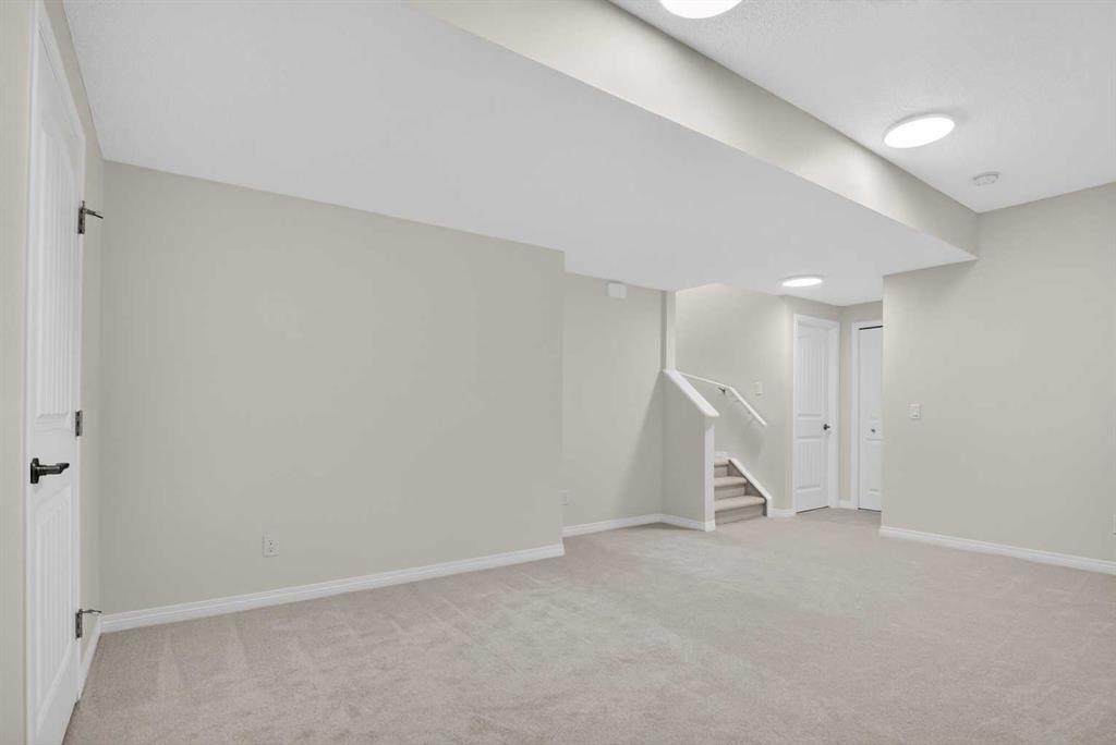 104 Masters Link Se, Calgary, AB - Indoor Photo Showing Other Room