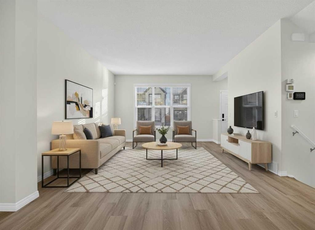 104 Masters Link Se, Calgary, AB - Indoor Photo Showing Living Room