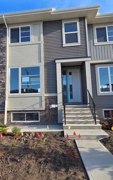 245 Cobblestone Gate Sw, Airdrie, AB - Outdoor With Facade