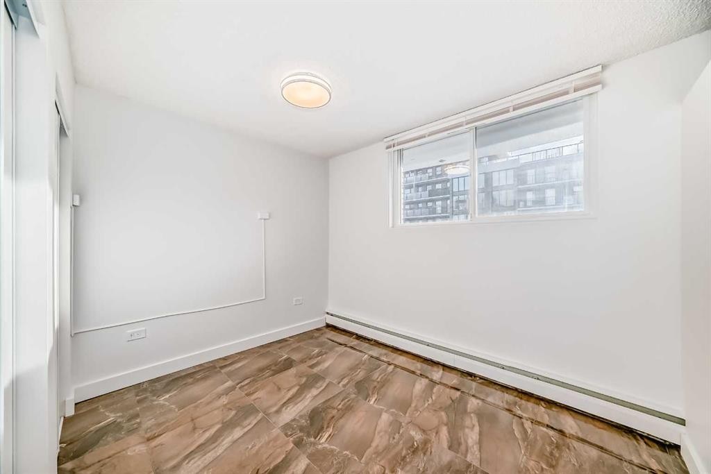 102-316 1 Avenue Ne, Calgary, AB - Indoor Photo Showing Other Room