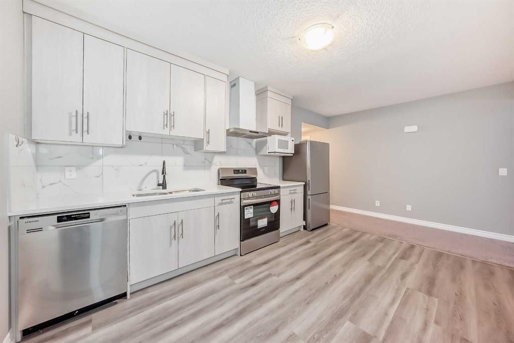 88 Nolanhurst Crescent Nw, Calgary, AB - Indoor Photo Showing Kitchen With Stainless Steel Kitchen