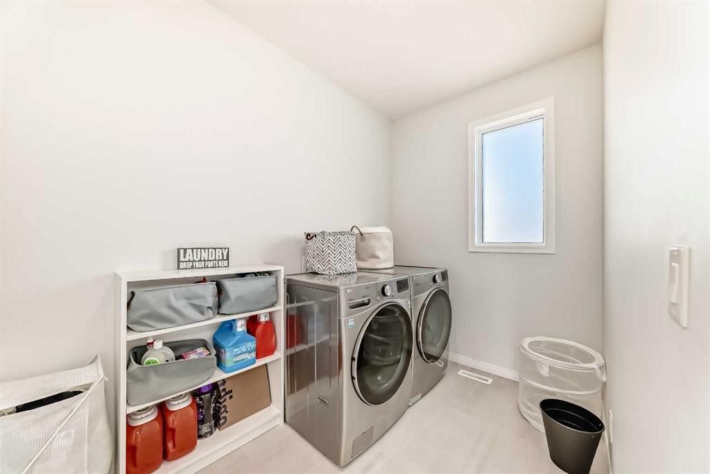 257 Carrington Way Nw, Calgary, AB - Indoor Photo Showing Laundry Room