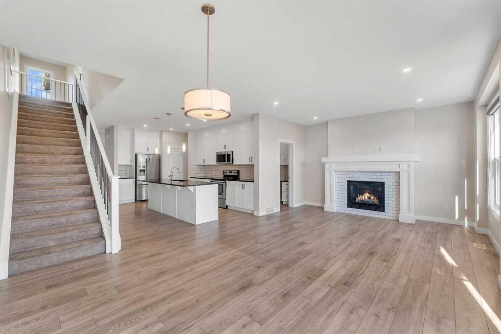34 Sage Bluff Heights Nw, Calgary, AB - Indoor With Fireplace