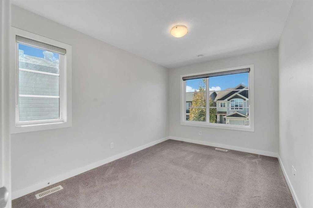 34 Sage Bluff Heights Nw, Calgary, AB - Indoor Photo Showing Other Room