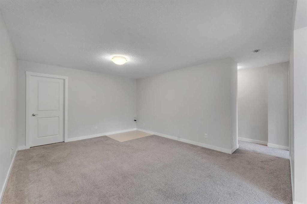 34 Sage Bluff Heights Nw, Calgary, AB - Indoor Photo Showing Other Room
