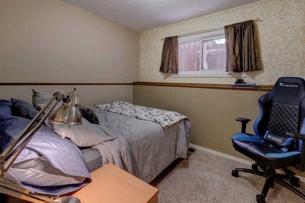 136 Templeby Place Ne, Calgary, AB - Indoor Photo Showing Bedroom