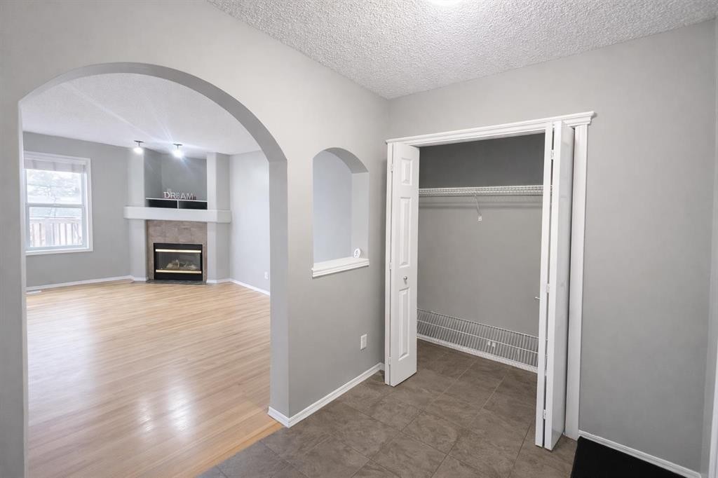 119 Country Hills Heights Nw, Calgary, AB - Indoor With Fireplace