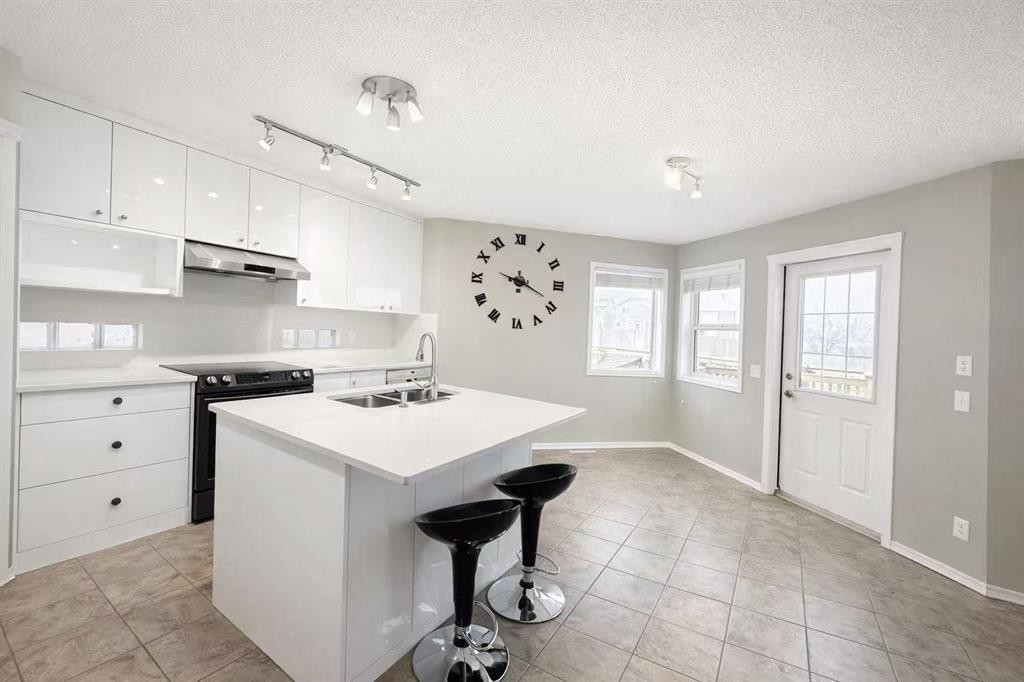 119 Country Hills Heights Nw, Calgary, AB - Indoor Photo Showing Kitchen With Double Sink