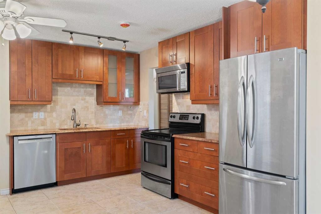 84 Maranda Close Ne, Calgary, AB - Indoor Photo Showing Kitchen With Stainless Steel Kitchen