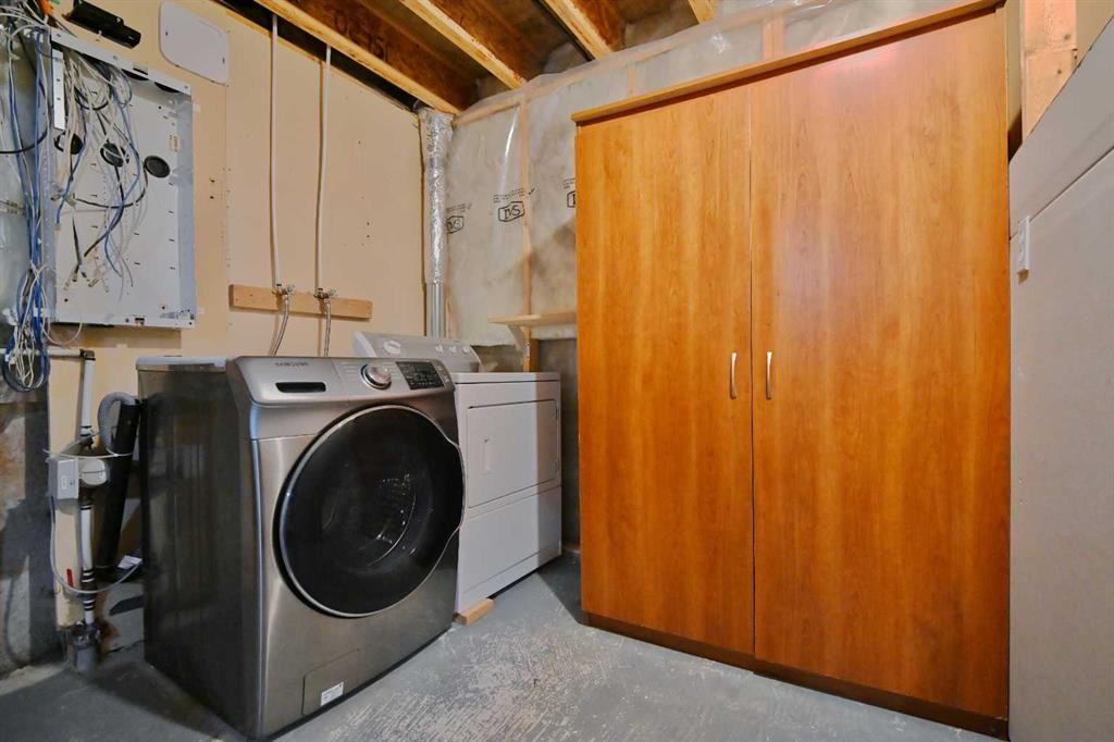 68 Covepark Close Ne, Calgary, AB - Indoor Photo Showing Laundry Room
