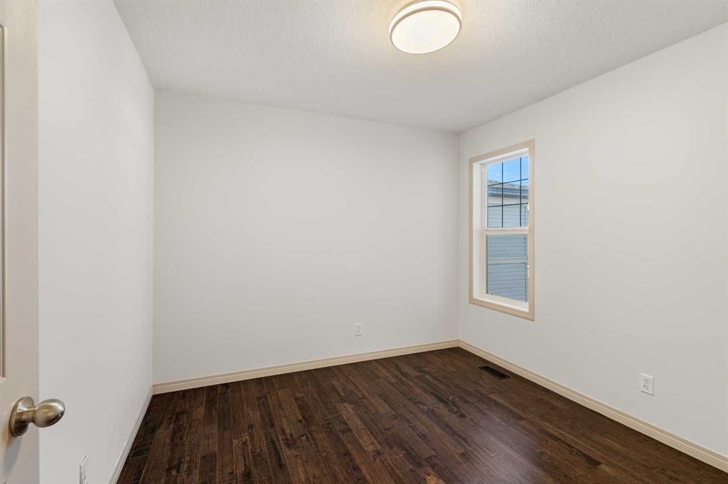 21 Panamount Row Nw, Calgary, AB - Indoor Photo Showing Other Room