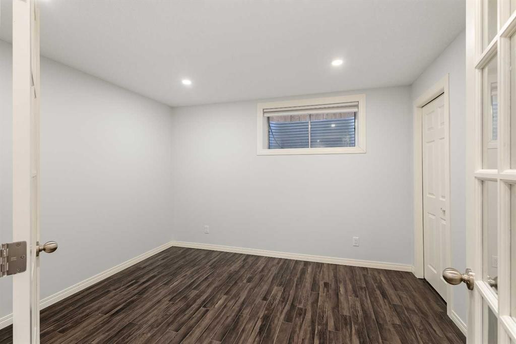 21 Panamount Row Nw, Calgary, AB - Indoor Photo Showing Other Room