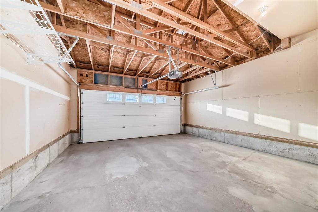 120 Springmere Grove, Chestermere, AB - Indoor Photo Showing Garage