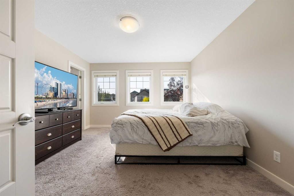 240 Sage Bank Grove Nw, Calgary, AB - Indoor Photo Showing Bedroom