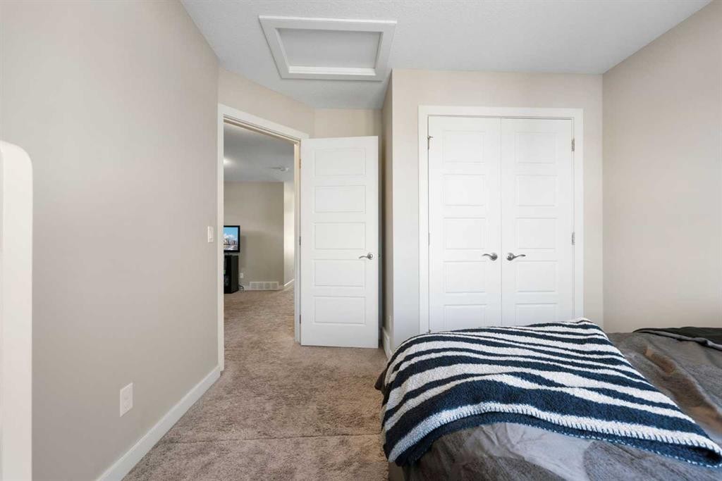 240 Sage Bank Grove Nw, Calgary, AB - Indoor Photo Showing Bedroom