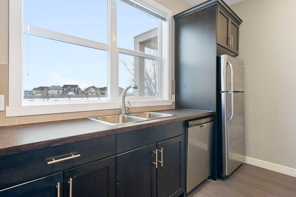 428 Redstone View Ne, Calgary, AB - Indoor Photo Showing Kitchen With Double Sink