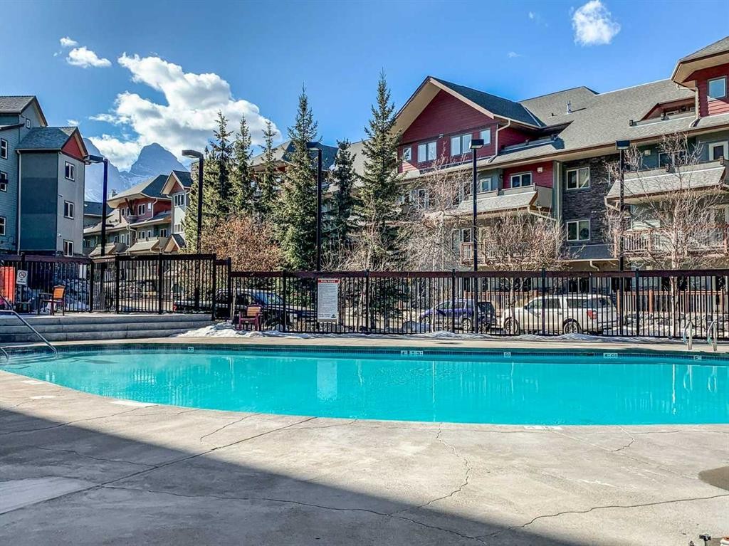 106-107 Montane Road, Canmore, AB - Outdoor With In Ground Pool