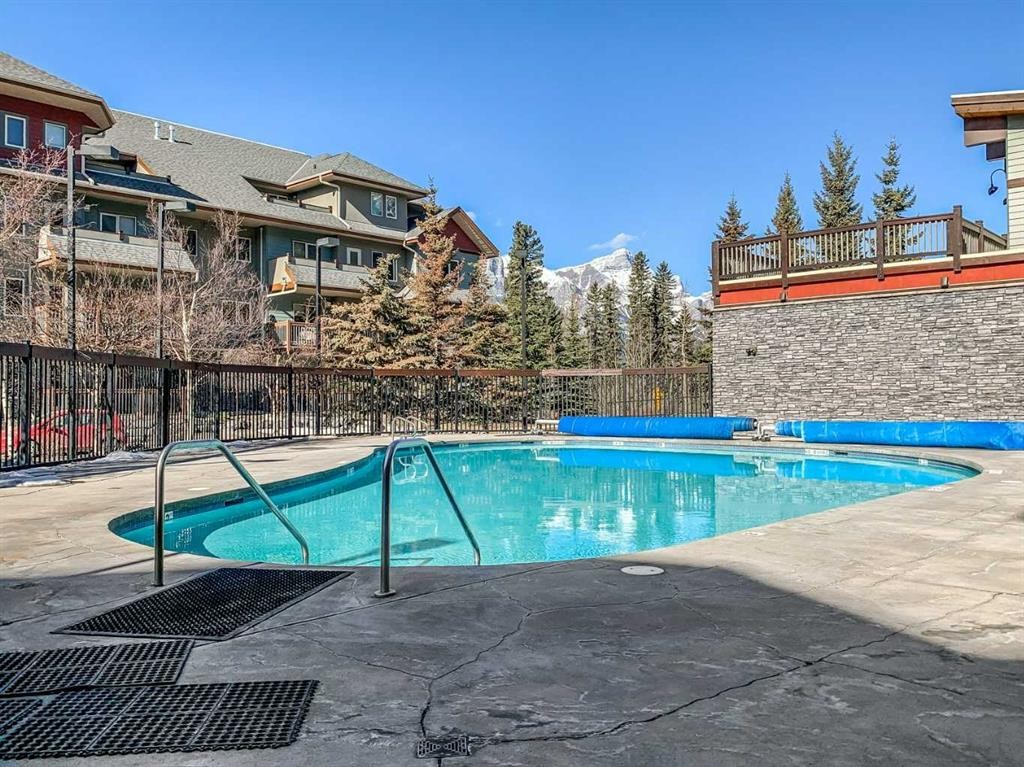 106-107 Montane Road, Canmore, AB - Outdoor With In Ground Pool