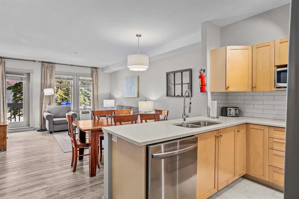 106-107 Montane Road, Canmore, AB - Indoor Photo Showing Kitchen With Double Sink