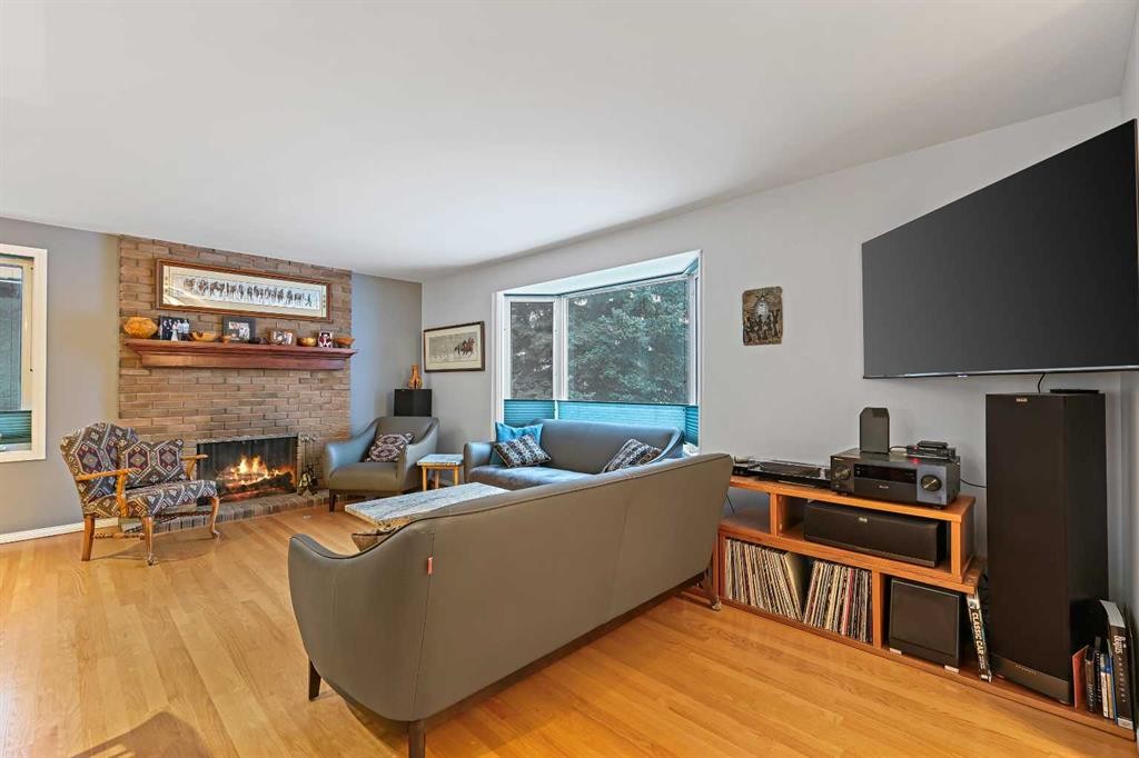 13119 6 Street Sw, Calgary, AB - Indoor Photo Showing Living Room With Fireplace