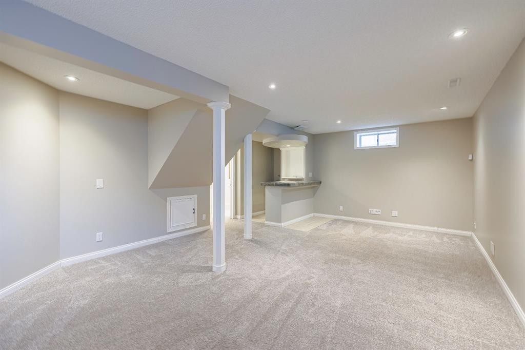 44 Macewan Ridge Close Nw, Calgary, AB - Indoor Photo Showing Basement