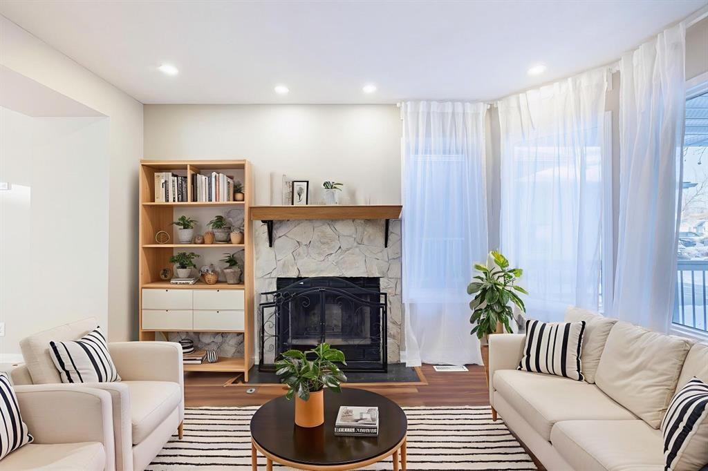 44 Macewan Ridge Close Nw, Calgary, AB - Indoor Photo Showing Living Room With Fireplace